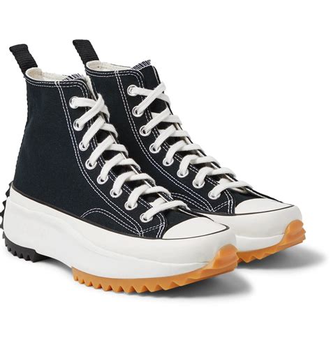 high top canvas sneakers.